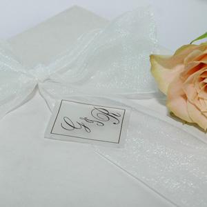 Simple initials will personalise your wedding stationery and look fantastic.
